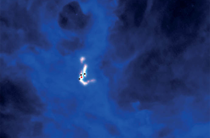 An image at radio wavelengths of a young stellar quadruplet. Credit: CfA/Nature/Pineda